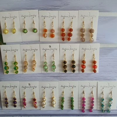 Ohrringe Handarbeit, Unikat, Perlen im Perlenrahmen Metall rund, goldfarben - Bild 1 von 2