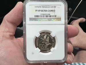 1976FM Trinidad $100 Gold NGC PF 69 Ultra Cameo (CCJ) - Picture 1 of 3