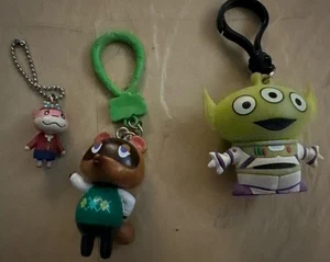 Tres dijes de mochila 2 Animal Crossing y 1 de Toy Story/Disney - Imagen 1 de 4
