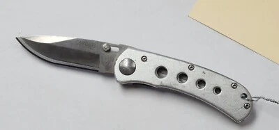 Cuchillo Plegable Camillus Hoja de Titanio Carbonitruro 3.5", Manijas de Aluminio -... Foto 1 de 4