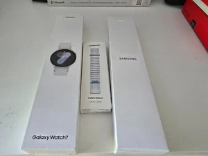 Samsung Galaxy Watch 7 LTE 44mm - SM-L315F - Silver/White - Offical Fabric Strap - Zdjęcie 1 z 2