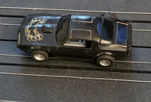 TYCO '79 PONTIAC FIREBIRD TRANS AM BLACK GOLD SLOT CAR - Picture 1 of 3