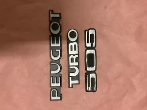 Peugeot 505 Turbo 1985 emblema trasero emblema maletero fabricante de equipos originales - Imagen 1 de 5