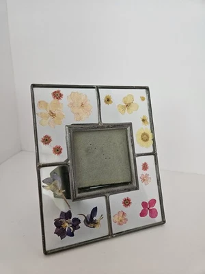 VTG Pressed Flower Frame in Leaded Glass w/Metal. Mult Color Flowers by Carr.  - Image 1 of 4