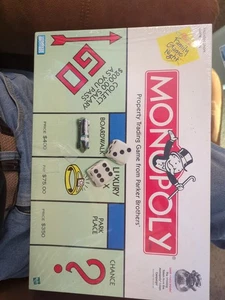 MONOPOLY PROPERTY TRADING GAME - BRAND NEW IN WRAP! - Picture 1 of 2