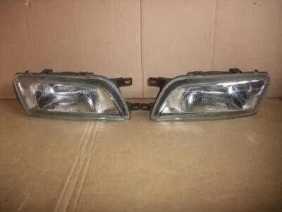 JDM NISSAN N14 FN14 PULSAR SUNNY SDN Headlight Right Left Set Used - Image 1 of 3