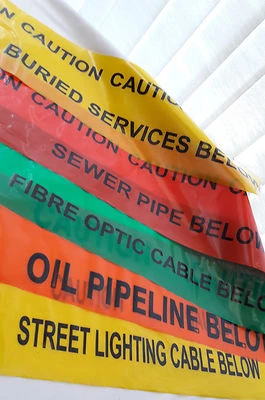 CAUTION Underground warning tape cut length Sewer Oil Fibre Services Lighting - Image 1 of 4