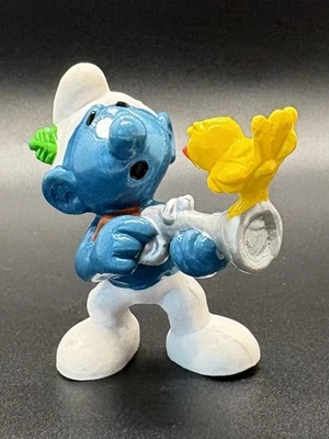 (B) Figura de colección Pitufo con rifle y pájaro amarillo 1978 Schleich PVC Hong Kong Foto 1 de 4