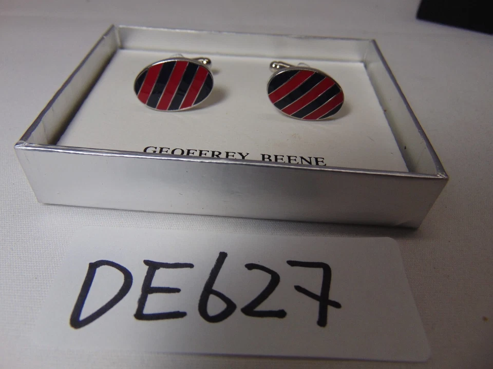 Gemelos Geoffrey Beene tono plateado y negro a rayas rojas y negras Foto 1 de 4