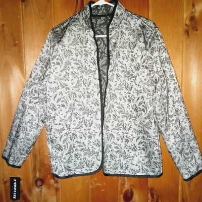 Chaqueta reversible para mujer nueva con etiquetas floral negra blanca talla S frente abierto Foto 1 de 4