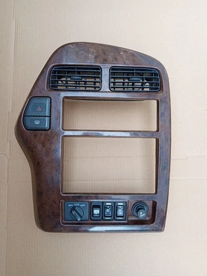 ➡️1997-2000 INFINITI QX4 WOODGRAIN 4WD 收音机 DASH HVAC TRIM BEZEL。 原始设备制造商。 — 第 1/4 张图片