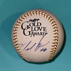 MARCEL OZUNA (Braves) Signed Official GOLD GLOVE Baseball Beckett (BAS)