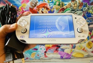 White Sony PlayStation PS Vita PSV Portable Console OLED PCH-1000 + Charger - Picture 1 of 2
