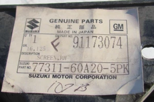 NOS GM 91173074 Suzuki 77311-60A20-5PK RH adorno cubierta negro 1989-98 - Imagen 1 de 11