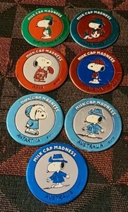 Lot Of 7 Snoopy Milk Cap Madness Pogs Peanuts Continents Charlie Brown - Picture 1 of 15