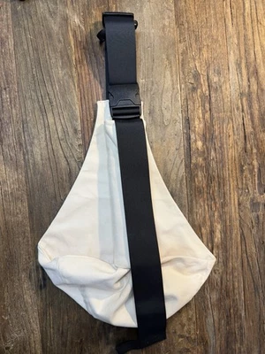 Correa acolchada ajustable color crema portador de cabestrillo para niños pequeños Foto 1 de 4