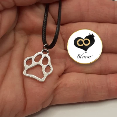 Collana nera con ciondolo ZAMPA di Cane Gatto Argento tipo caucciu da Uomo Donna - Immagine 1 di 4