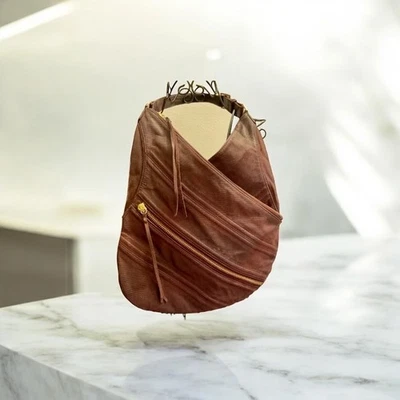 Bolso de cuero granulado color ciruela BOGNER... Foto 1 de 4