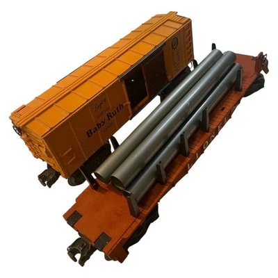 Lot of 2  Lionel O Gauge X2454BR PRR Baby Ruth Boxcar 6511 Pipe Flat Car 4 Pipes - Image 1 of 4