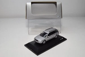 B69 1:43 SCHUCO VW VOLKSWAGEN PASSAT B5 VARIANTE GRIS MIB CAJA DE DISTRIBUIDOR - Imagen 1 de 18