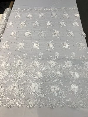 WHITE 3D FLORAL DESIGN EMBROIDERY WITH PEARLS ON A MESH LACE-SOLD BY YARD. - Image 1 of 4