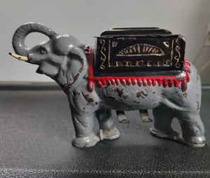 Raro antico dispenser meccanico a rullo per sigarette elefante in ghisa FUNZIONANTE - Foto 1 di 11