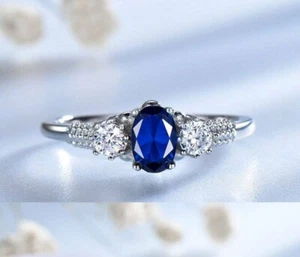 2Ct Oval Cut CZ Blue Sapphire Three-Stone Engagement Ring 14K White Gold Plated - Picture 1 of 5