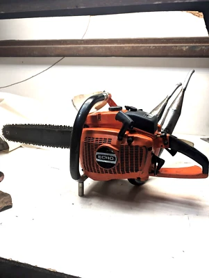 VINTAGE PIPED TWIN SAW ECHO CST-610EVL 2 CYLINDER CHAINSAW W/18” BAR & CHAIN - Image 1 of 4