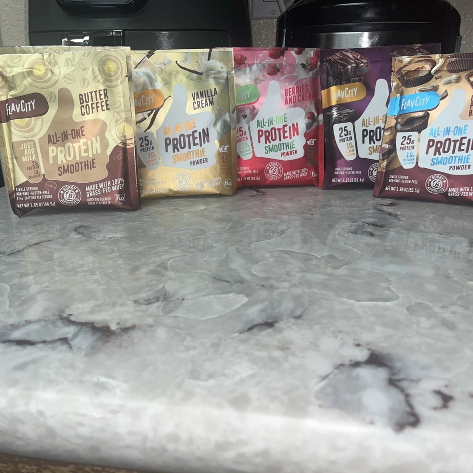 Paquete de variedad de batidos de proteínas todo en uno Flav City de una sola porción Foto 1 de 4