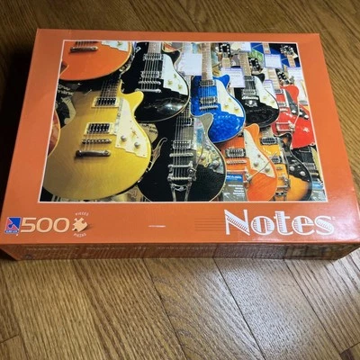 Sure Lox 500 Pc “Notes” Sealed 2009 Puzzle Vintage 19 X 14 Guitar Shop - Image 1 of 4