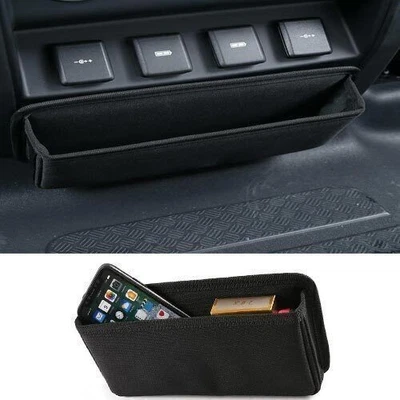 Bolsa de almacenamiento de ventilación de aire acondicionado trasera de tela negra para Land Rover Defender 110 90 2020-23 Foto 1 de 4