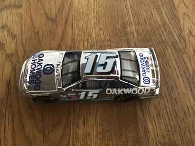 Oakwood Homes Ken Schrader #15  1/64 Scale 1999 Chrome Die Cast  Racing Champion - Image 1 of 4