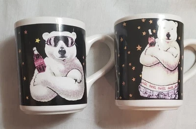 Tazas Coca-Cola Polar Bear 1999 Gibson cerámica negro/blanco/dorado estrellas 4,25" de alto Foto 1 de 4