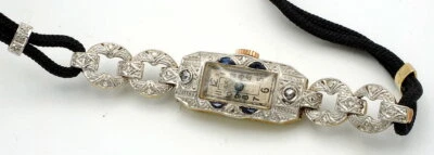 Antiguo Art Deco Platino y Oro 18K E.C. Reloj 15J Suizo 24 Diamantes 4 Zafiros Foto 1 de 4