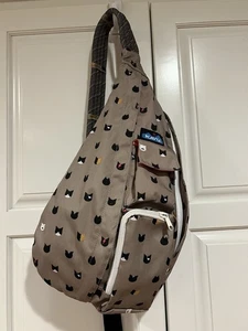 KAVU Sling Rucksack für Wandern Camping oder Alltag - Katzenmotiv, brauner Hintergrund - Bild 1 von 15