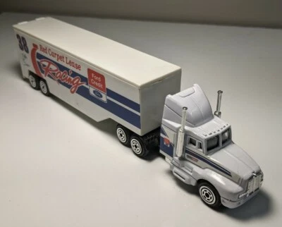 Racing Champions NASCAR #38 Ford Credit Red Carpet Lease HO Kenworth Semi Truck - Image 1 of 4