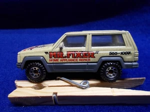 Matchbox MB27 Olive, Dark Gray Lower Jeep Cherokee "Mr. Fixer" on Doors & Hood - Picture 1 of 3