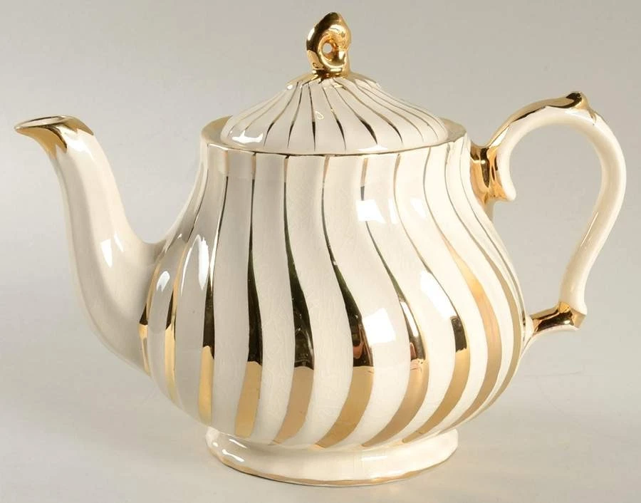 MCM Tetera Vintage Inglaterra Británica Oro Remolino Sillín Mediados de Siglo Moderno Hogar WOW Foto 1 de 1