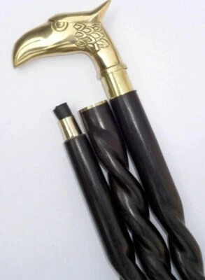 Bastón de madera espiral retorcido tallado a mano de diseñador bastón mango de águila de latón Foto 1 de 4