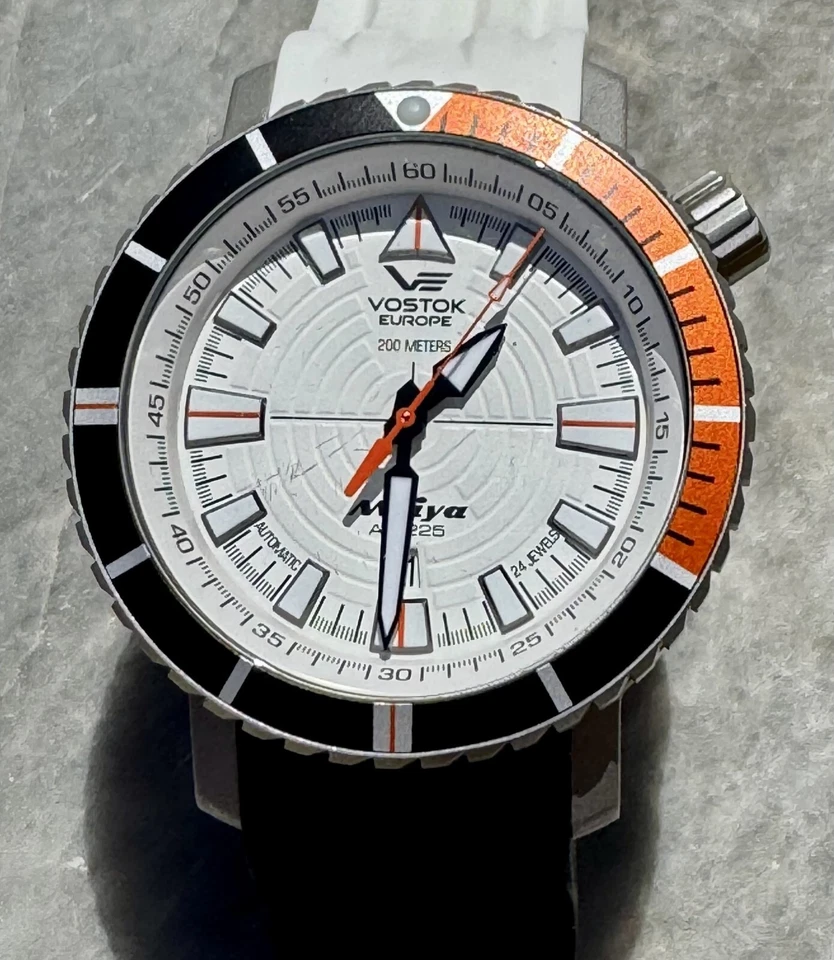 VOSTOK EUROPE AN-225 MRIYA AUTOMATIC WATCH 50MM WHITE DIAL ORANGE BLACK BEZEL RA - Image 1 of 4