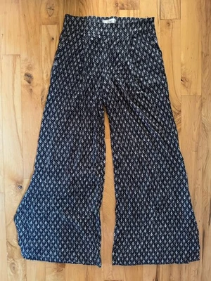 Pantalones ELEVENSES ANTHROPOLOGIE para mujer XS cremallera lateral fluidos Palazzo Boho negro blanco Foto 1 de 4