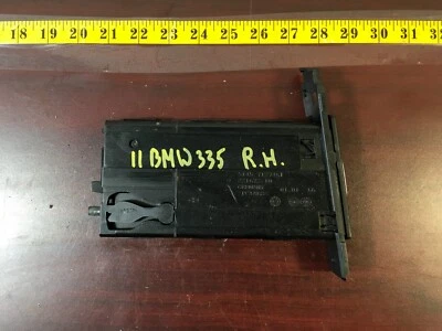 BMW 335i 2011-2013 portavasos lateral derecho pasajero negro 7127461 OEM. Foto 1 de 4