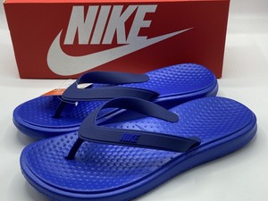nike flip flops blue
