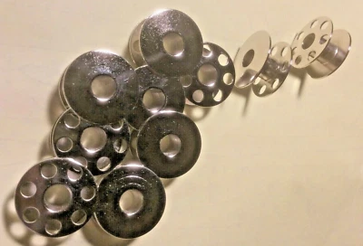 10 bobinas de metal para máquina de coser Elna número de piezas 426000 para muchos modelos antiguos Foto 1 de 3