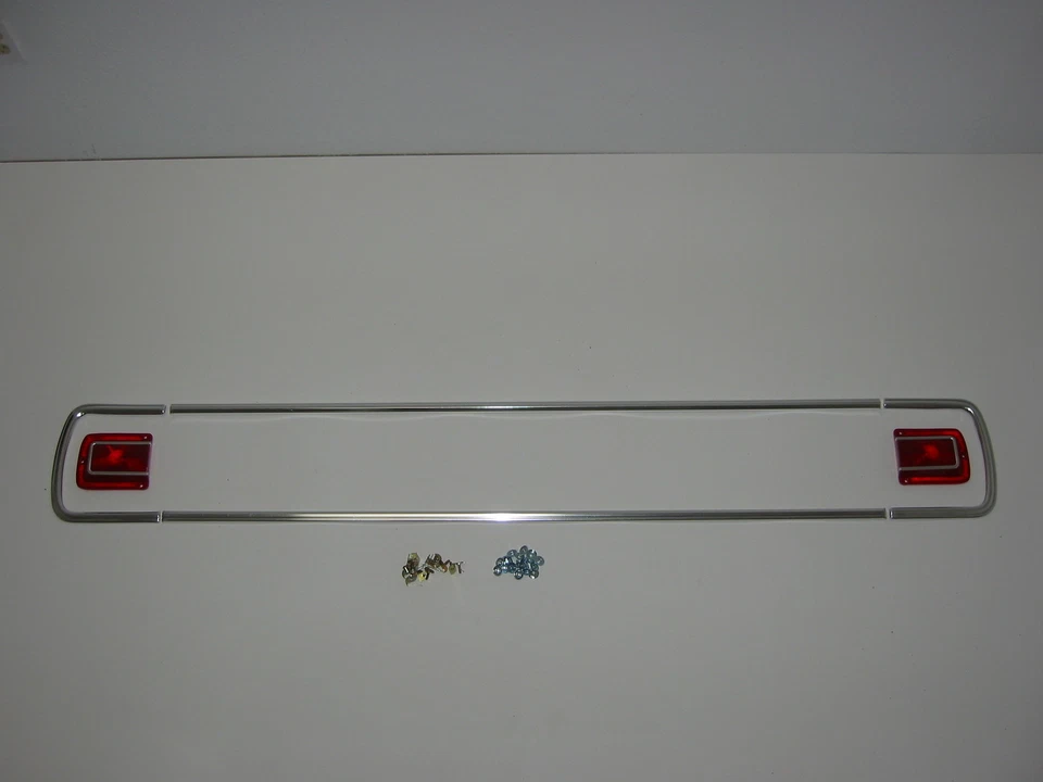 65 Chevelle Rear Panel Upper/Lower Moldings with Taillight Lens and "C" Moldings - Image 1 of 1
