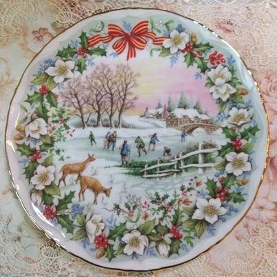 Placa decorativa Royal Albert patinaje exterior Foto 1 de 4