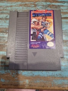 Strider Nintendo Nes Capcom Ntsc solo carrello Usa piccolo nick su etichetta - Foto 1 di 5