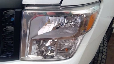 Driver Headlight Halogen Chrome Interior Bezel Fits 16-19 TITAN XD 6811229 - Image 1 of 4