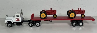 Ertl 1/64 Diecast Mack MF Semi Truck Flatbed Trailer 2 Massey 44 Tractors Hauler - Image 1 of 4