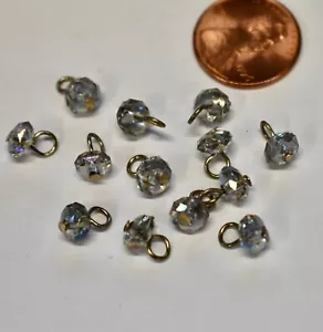 VINTAGE 12 PICCOLI BOTTONI PER BAMBOLE IN PLASTICA * SFERE AURORA SFACCETTATE • 5,5mm - Foto 1 di 2
